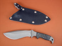 "Hooded Warror" Tactical combat custom knife, obverse side view in ATS-34 high molybenum stainless steel blade, 304 stainless steel bolsters, canvas micarta phenolic handle, locking kydex, aluminum, stainless steel, nickel plated steel sheath