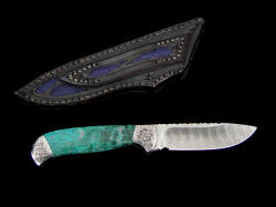 "Izar" reverse side view. Blue stingray skin inlays extend to sheath back and belt loop. Note varied colors and texture of the Chrysocolla gem knife handle