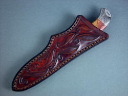 "Izar" custom handmade knife sheath view. The sheath is tough, thick leather shoulder, hand-carved and hand-stitched