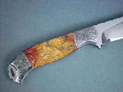 "Izar" custom handmade knife, reverse side view. Engraving matches fine and delicate lines in the jasper pattern