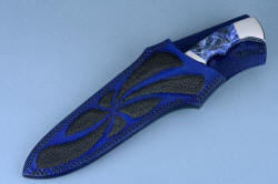 "Kadi" sheathed view. Sheath is deep and protective, with handle displayed and high back to protect wearer.