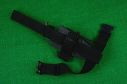 "Kairos" professional counterterrorism tactical knife, shown mounted on EXBLX leg mount, back side details