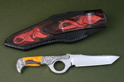"Knapp Trailhead" reverse side view. Sheath back and belt loop are hand-carved with matching design motif