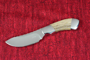 "Kochab" knife obverse profile view  in T3 deep cryogenically processed 440C high chromium martensitic stainless steel blade, 304 stainless steel bolsters, Petrified Sycamore Wood gemstone handle, sheath of lizard skin inlaid in hand-carved leather shoulder, nylon 