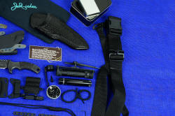 "Krag" tactical, counterterrorism professional knife, complete set vignette of knife, sternum harness extreme right side of photo