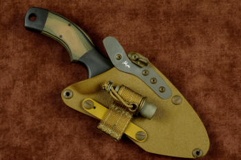 "Krag" tactical, counterterrorism, crossover knife, LIMA mounted view in ATS-34 high molybdenum martensitic stainless steel blade, 304 stainless steel bolsters, coyote, black, olive G10 fiberglass/epoxy composite handle, hybrid tension tab-locking sheath in kydex, anodized aluminum, gold oxide stainless steel and anodized titanium
