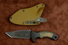 "Krag" tactical, counterterrorism, crossover knife, obverse side view in ATS-34 high molybdenum martensitic stainless steel blade, 304 stainless steel bolsters, coyote, black, olive G10 fiberglass/epoxy composite handle, hybrid tension tab-locking sheath in kydex, anodized aluminum, gold oxide stainless steel and anodized titanium