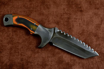 "Krag" tactical, counterterrorism, crossover knife, reverse side view in T4 cryogenically treated 440C high chromium martensitic stainless steel blade, 304 stainless steel bolsters, Orange and Black  G10 fiberglass/epoxy composite handle