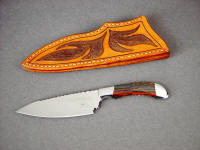 "La Cocina" chef's knife, obverse side view in ATS-34 high molybdenum stainless steel blade, 304 stainless steel bolsters, Australian Tiger Iron Gemstone handle, hand-carved leather sheath