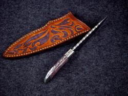 "La Cocina" fine handmade chef's kitchen knife, edgework, filework detail Filework is bold and deep modified vine pattern