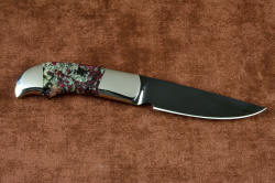 "Lacerta" reverse side view in deep cryogenically treated O1 tungsten-vanadium tool steel blade, hot blued, 304 stainless steel bolsters, Eudialite gemstone handle, sheath of hand-carved leather inlaid with Ostrich leg skin