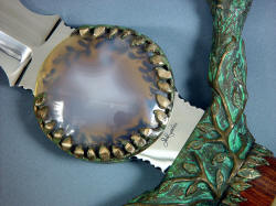 "Lycaon" obverse side ricasso detail, showing polished agate cabochons, maker's mark, cast bronze sword guard