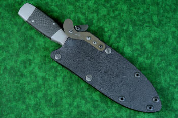 "Lynx" Custom tactical knife,sheathed view with tension lock applied, in T3 cryogenically treated ATS-34 high molybdenum martensitic stainless steel blade, 304 stainless steel bolsters, carbon fiber handle, hybrid tension tab-wedge sheath in kydex, anodized aluminum, anodized titanium, blackened stainless steel