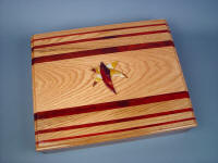 "Macha Navigator" case in red oak, bloodwood, with inlays of Mookaite Jasper gemstone