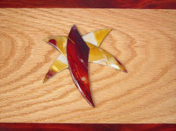 "Macha Navigator" case top mosaic inlay detail. Mookaite Jasper gemstone inlaid in Red Oak with Redheart hardwood