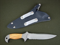 "Macha Navigator" reverse side view. Sheath has die formed aluminum belt loops that are reversible and can be located in several positions along the welts of the sheath