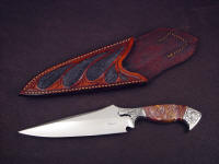 "Malaka" obverse side view: 440C high chromium stainless steel blade, hand-engraved 304 stainless steel bolsters, Cabernet Jasper gemstone handle, black stingray skin inlaid in hand-carved leather sheath