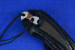 "Mariner" sailor's knife and "Seahawk" marlinspike, lanyard attachment detail. Lark's head used to attach sliding noose lanyard to large diameter lanyard holes 