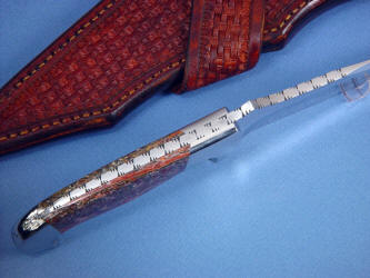 "Mercury Magnum" spine view, filework detail. Note thick spine for strong blade to handle junction, dovetailed bolsters and gemstone handle scales