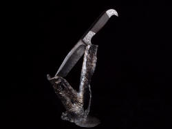 "Morta" knife and stand. Knife rests in hand-cast bronze, unique and singular knife sculpture