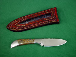 "Mule," reverse side view. Sheath back belt loop has inlay of black frog skin in heavy leather, hand-stitched and tooled