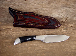 "Mule" reverse side view. Note sparse pattern Snowflake Obsidian gemstone, inlays on back of sheath