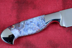 "Opere" reverse side gemstone fossil handle view in 440C high chromium martensitic stainless steel blade, 304 stainless steel bolsters, Bay of Fundy Fossilized Agate gemstone handle, frog skin inlaid in hand-carved leather sheath