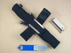 "PJLT" with ultimate sheath extender option, accessories removed. Diamond pad sharpener, and magnesium-firesteel block in stainless steel fittings.