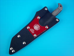 USAF Pararescue Instructors CSAR knife, sheeathed view. Sheath is durable and deep, protecting knife and wearer, one of the toughest combat knife sheaths made