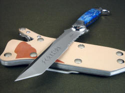 "PJLT" handmade custom knife point detail. Tanto point is sharp and tough, custom etching is deep in blade hollow grind
