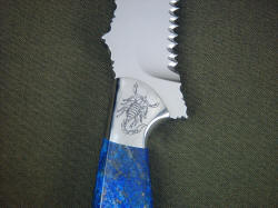 "PJLT" custom handmade knife, reverse side front bolster engraving detail. Matched scorpion engravings match desert theme of knife