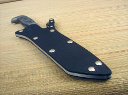 "PJ" defensive tactical knife, sheath tip view. Note quarter inch thick high strength corrosion resistant aluminum welt fram, double thickness kydex