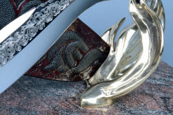 "Pallene" custom handmade knife sculpture, sheath tailpiece resting in heavy cast bronze stand base