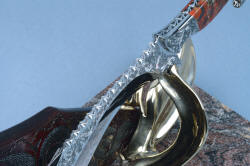 "Pallene" custom handmade knife sculpture, spine filework detail. Knife blade ricasso rests in neoprene-lined bronze 