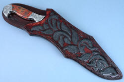 "Pallene" custom handmade knife sculpture, sheathed view. Sheath is deep and protective, with a high back and elaborate inlays and hand-stitching