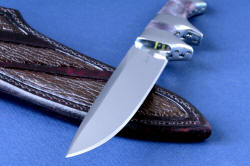 "Patriot" knife blade point detail. Point is thin and extremely sharp, with heavy relief and deep hollow grind for longevity.