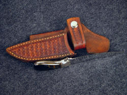 "Pecos II" inside handle tang detail. Knife tang is fully fileworked, with dovetailed bolsters and gemstone handle