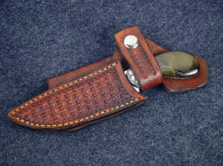 "Pecos II" sheathed detail. Snap flap retention of knife in horizontal sheath is secure