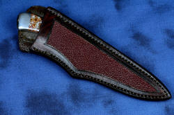 "Phact" fine handmade knife, sheathed view. Sheath is protective and stout with rayskin inlays and stiff leather shoulder