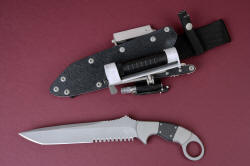 "Raijin" obverse side view. Knife is strong and elegant, with substantial cutting edge and reverse grip finger ring for security. Sheath and accessories are abundant and useful
