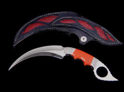 "Raptor" kerambit, reverse side view. Sheath back is full of hand-carved inlays of red stingray skin, even in large belt loop