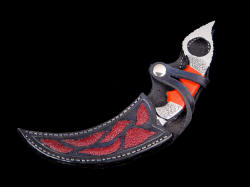 "Raptor" kerambit, sheathed view. Sheath protects from cutting edges and point, yet displays beautiful gemstone handle in profile