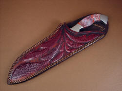 "Saussure" slip sheath view. Thick sheath welts protect the cutting edge of the knife, inlays of ostrich leg skin add beauty, sheath is all double row stitched in polyester