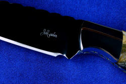 Maker's mark detail of "Secora" fine handmade custom knife in T3 cryogenically treated 440C high chromium stainless steel blade, 304 stainless steel bolsters, Picasso Marble gemstone handle, hand-carved crossdraw leather sheath inlaid with Teju lizard skin