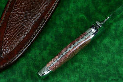 "Streamspear" dagger, tang filework, edgework detail. Filework in fully tapered tang, bolsters are dovetailed to lock bedded gemstone handle scales to tang 