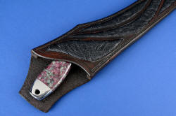 "Taibhse" sheath mouth detail. High back protects wearer, offers low position on belt line, enough handle exposed to make easy unsheathing and hint of blade inside