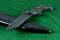 "Taranis" professional grade tactical, counterterrorism, rescue knife, point detail. Tanto point is wide and strong, wit top swage for decreased penetration thickness 