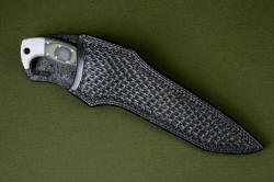 "Taranis" sheathed view, leather sheath. Sheath is deep and protective, with enough handle for easy unsheathing and a high back to protect the wearer.