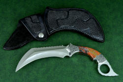 "Titan" karambits, fine handmade custom knives, obverse side view. Blade is a diffiicult grind to master