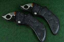"Titan" karambits, fine handmade custom knives, sheathed pair view. Sheaths are matched and interchangeable with the knives